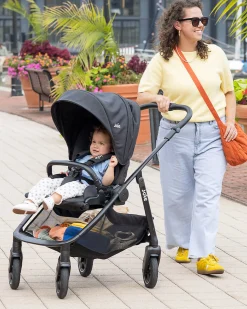 Passeggino Versadrift 4 in 1 con Ruote a 360° - Nero – Reversibile, dalla Nascita fino a 22 kg
